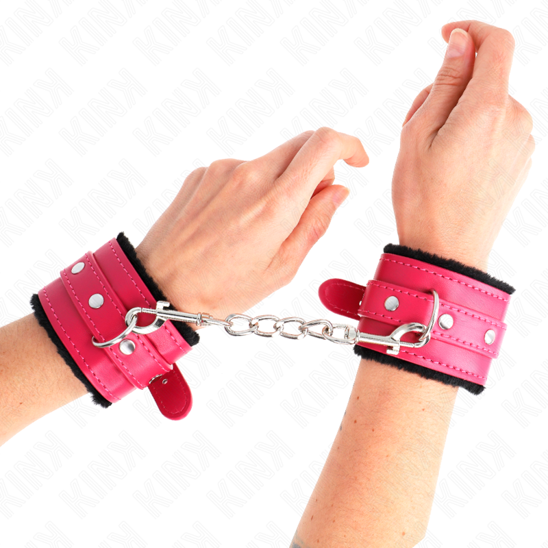 Kink - muñequeras forradas premium negro con correa fucsia